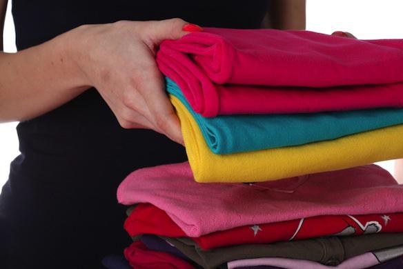 A girl folding clothes